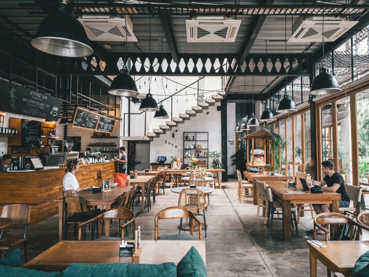 Guests dining across an open restaurant floor